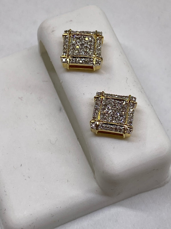 Genuine 10kt Gold & 0.25 CTW Diamond Earrings.