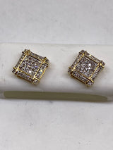 Genuine 10kt Gold & 0.25 CTW Diamond Earrings.