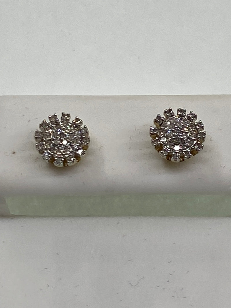 Genuine 10kt Gold & 0.18 CTW Diamond Earrings.